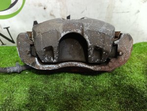 Суппорт передний левый HONDA ODYSSEY OEM 45019S4X003 RA6 2001