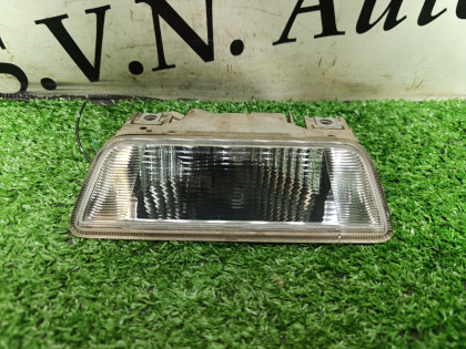 Катафот заднего бампера левый TNT31