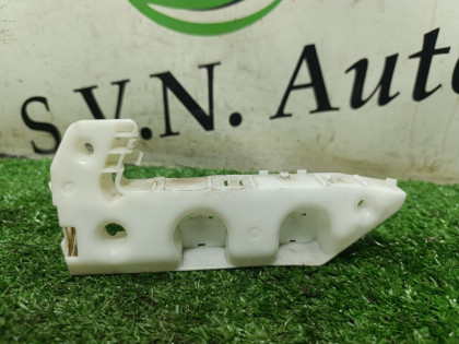 Кронштейн переднего бампера левый DNT31