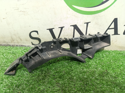 Кронштейн переднего бампера правый C140