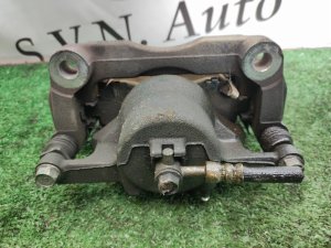 Суппорт передний левый NISSAN X-TRAIL DNT31 2010