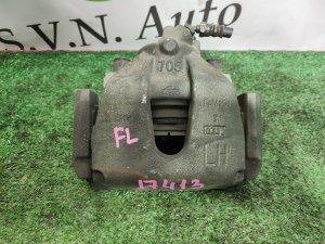 Суппорт передний левый MAZDA PREMACY