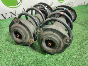 Стойка передняя (пара) NISSAN X-TRAIL OEM E4302JG71A, E4303JG71A DNT31 2010