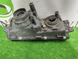 Фара левая MITSUBISHI DIAMANTE OEM MR162085 F12A 1994