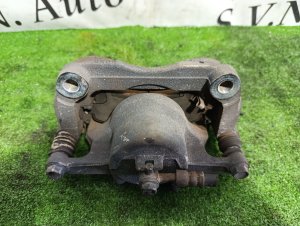 Суппорт передний левый NISSAN X-TRAIL OEM 41011JE00A DNT31 2010