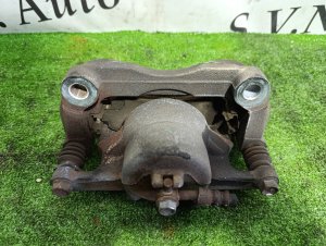 Суппорт передний левый NISSAN X-TRAIL OEM 41011JE00A DNT31 2010