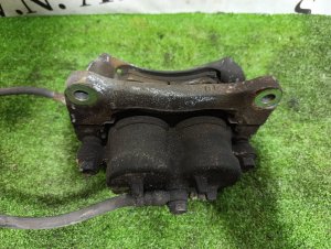 Суппорт передний левый MITSUBISHI PAJERO OEM MR510537 V88W 2011