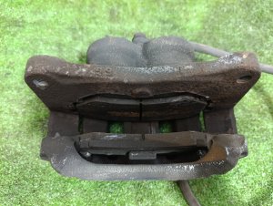 Суппорт передний левый MITSUBISHI PAJERO OEM MR510537 V88W 2011